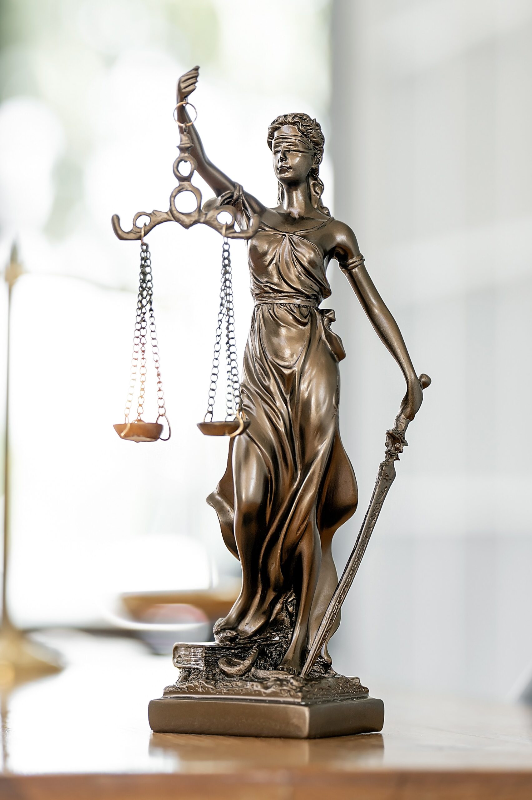 statue-of-lady-justice-with-scales-of-justice-on-w-2026-03-17-06-30-16-utc